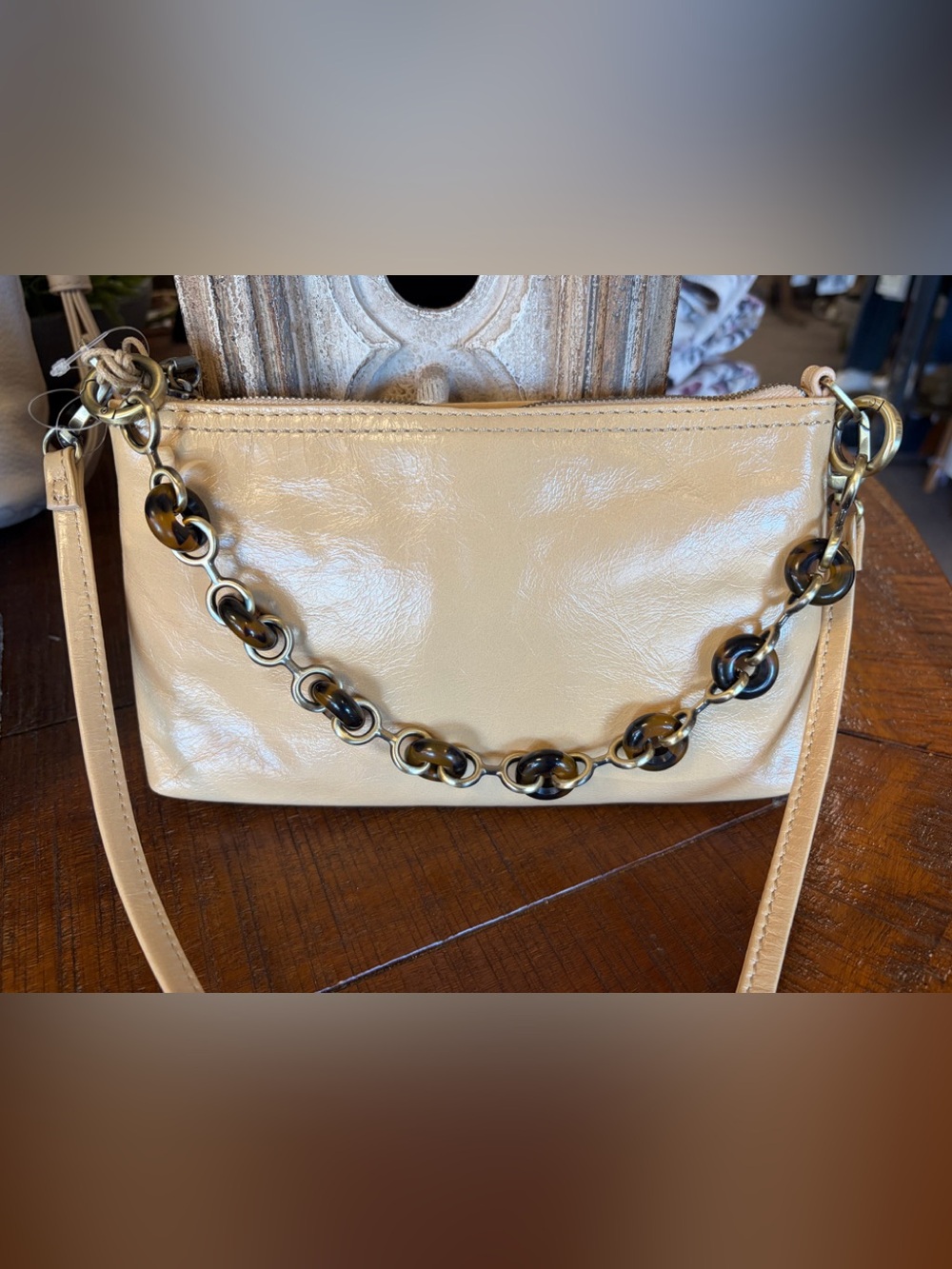 Hobo Darcy Cream Leather Crossbody Bag with Tortoiseshell Chain Accent